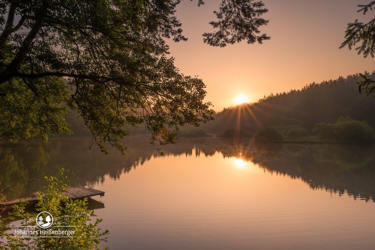 See mit Sonnenuntergang